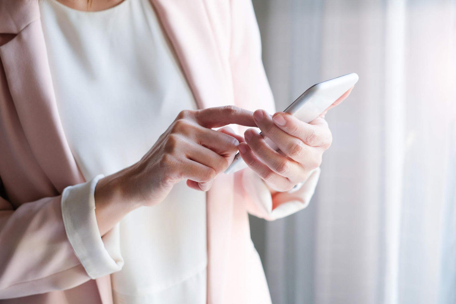 Healthcare consumer researching treatment options on a phone